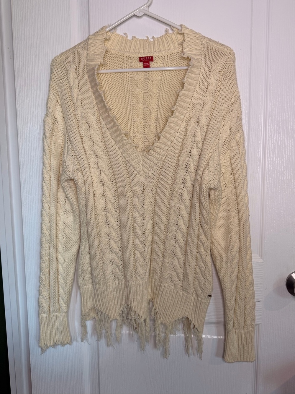GUESS Cream Cable-Knit V-Neck Sweater with Distressed Hem
